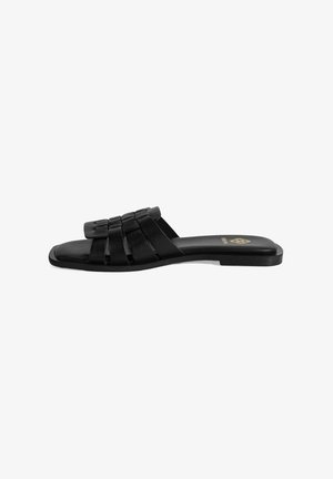 Zwarte sandalen met een platte zool, voorzien van gevlochten bandjes op de bovenkant. Glad afwerking, minimalistisch ontwerp en geen zichtbare hardware.