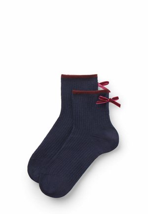 Navy ribbed ankle socks with a maroon cuff and small burgundy bows on the back sides. Soft texture, lightweight fabric.