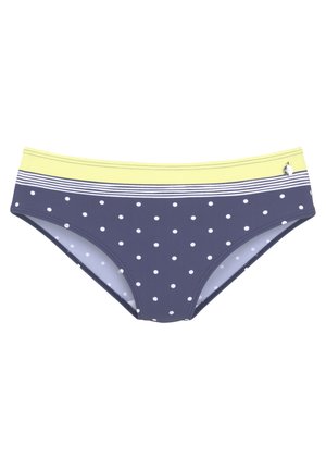 Marineblauwe polkadot bikini Onderstuk met een gele gestreepte tailleband; gladde textuur, klassiek ontwerp, met witte stippen en een klein logo-detail.