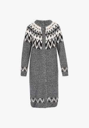 Pilkos megztos švarkas su apvalia kaklo iškirpte, turintis balto ir juodo zigzago raštą viršutinėje dalyje ir rankogaliuose. Priekinis mygtukų užsegimas.