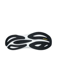 Suela de zapato en blanco y negro con una superficie de goma texturizada, surcos prominentes y un logo de "Goodyear" en amarillo.