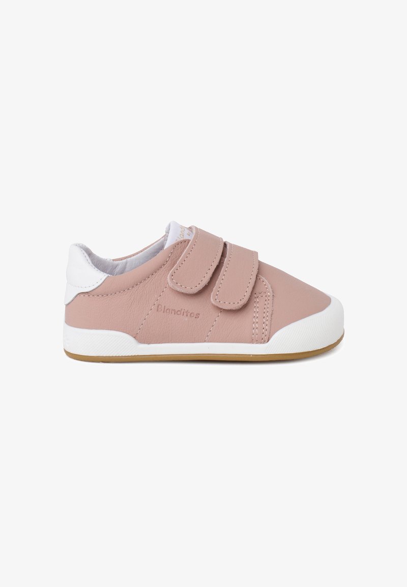 Light pink leather sneaker with white accents and two Velcro straps. The sole is white with a textured grip. Simple design, suitable for casual wear.