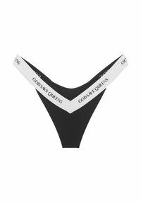 Zwarte string van gladde stof met een witte elastische tailleband waarop "GOD SAVE QUEENS" in het zwart is gedrukt. V-vormig ontwerp.