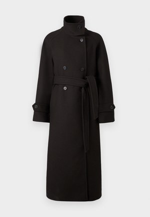 Schwarzer Wolltrenchcoat mit hohem Kragen, doppelreihigem Design und einem Stoffgürtel. Verfügt über große schwarze Knöpfe und weite Ärmel.