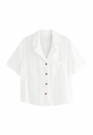 Witte short-sleeve shirt met een textuurdesign, knoopsluiting aan de voorkant met houten knopen, en een borstzak.