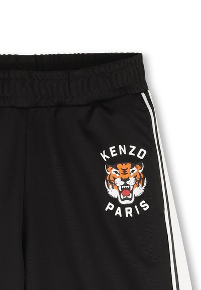 Zwarte sportbroek met een elastische tailleband, twee witte zijstrepen en een kleurrijke tijgerafbeelding met de tekst "KENZO PARIS".