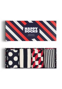 Vier Paare Erwachsenensocken in einer Geschenkbox. Die Designs umfassen marineblaue Punktmuster, Streifen, rote und marineblaue geometrische Muster sowie klassische Streifen.