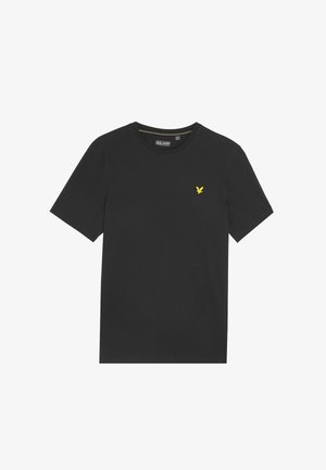 Sort T-shirt med korte ærmer lavet af bomuld, med rund hals og et lille gult ørne-logo på venstre bryst. Blød tekstur.