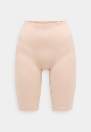Nude sømløse sykkelshorts med høy midje, glatt tekstur og subtile sømmer for ekstra støtte og komfort.