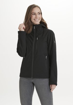 Black zippered jacket with two front pockets, adjustable hood, and textured fabric detail. Fitted shape, seamless design, and reinforced cuffs.