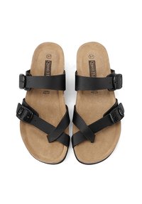 Sandali neri con cinturini incrociati, fibbie regolabili e una soletta beige imbottita. Suola in gomma texturizzata per una buona aderenza. Taglia 37.