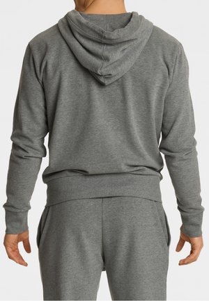 Szara bluza z kapturem w luźnym kroju, z kapturem ze sznurkiem, ściągaczami na rękawach i gładką fakturą. Widok z tyłu przedstawia minimalistyczny design.