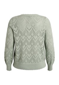 Gaiši zaļš adīts džemperis ar chevron rakstu, kas izceļas ar atvērtu šuvju detaļām, ribotām piedurknēm un jostu, piedāvājot teksturētu izskatu.