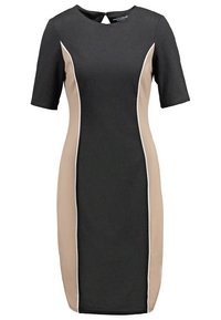 Black fitted dress with short sleeves, featuring beige side panels and white piping. Round neckline with a small keyhole detail at the back.