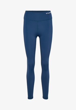 Navy blue leggings made from stretchy fabric. Features a high waistband and seamless design with a logo accent on the front.