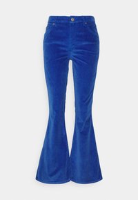 Calças de veludo cotelê azuis com fecho de botão, bolsos frontais e uma textura suave. Apresentam uma cintura alta e um design justo.