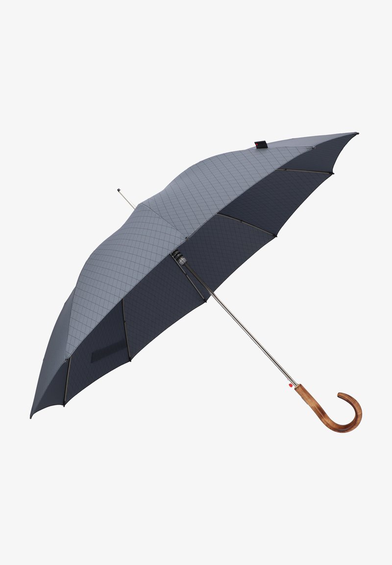 A dark gray umbrella with a checkered pattern, a silver metallic shaft, and a curved wooden handle. The canopy is slightly arched.
