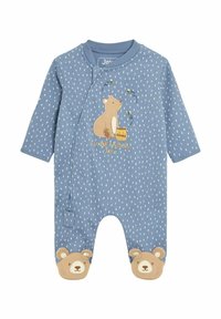 Body azzurro a maniche lunghe con design di orsetto, caratterizzato da puntini bianchi a forma di goccia e faccine di orso sulle scarpe. Realizzato in tessuto morbido, con chiusura a scatto.