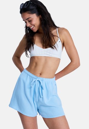 Hellblaue, bequeme Shorts aus weichem Stoff mit elastischem Bund und Kordelzug. Sie verfügen über einen klassischen Schnitt und ein lässiges Design.