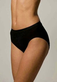 Melnas augstas vidukļa biksītes, izgatavotas no gludas auduma, ar bezšuvju dizainu, elastīgu jostu viduklī un smalkām šuvju detaļām.