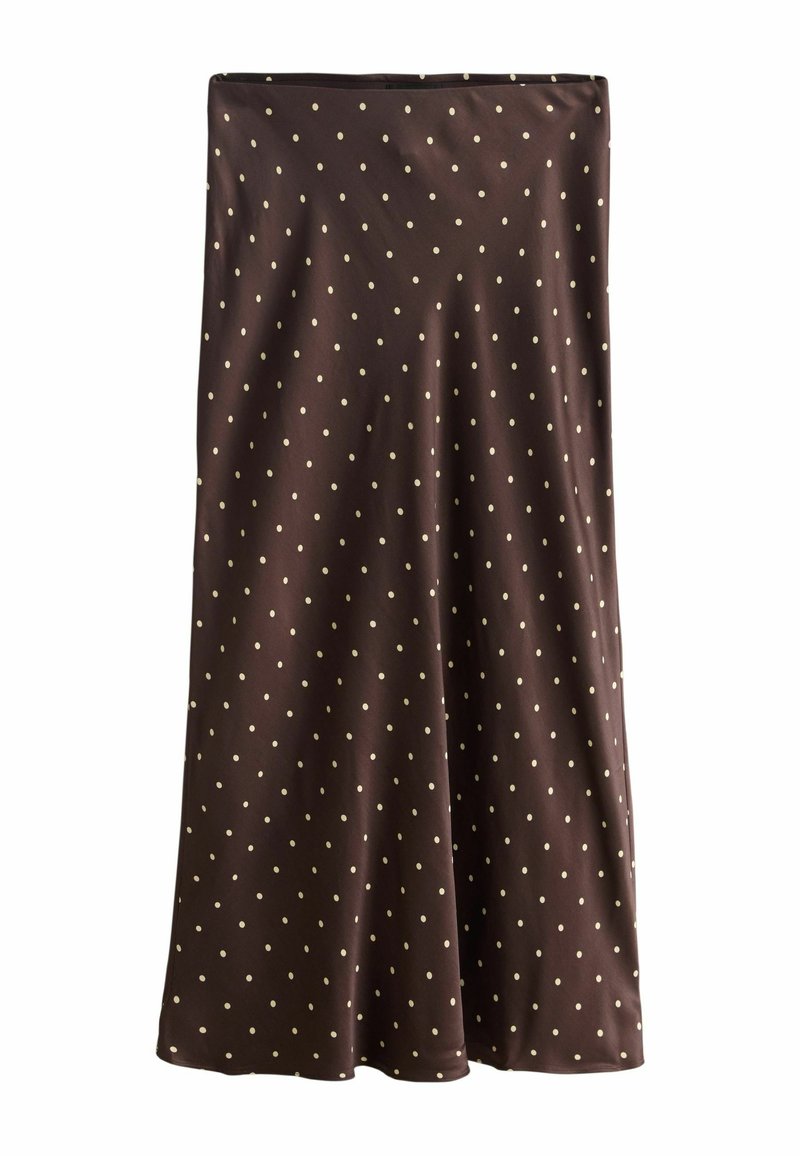 Hnědá sukně s bílými puntíky, s hladkou texturou a splývavým střihem. Spodní část je mírně rozšířená pro pohodlné nošení.
