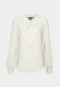 Bílá blůza s krčním uzlem, dlouhými nafouknutými rukávy, hladkým povrchem a přiléhavými manžetami. Jednoduchý design bez vzorů nebo ozdob.