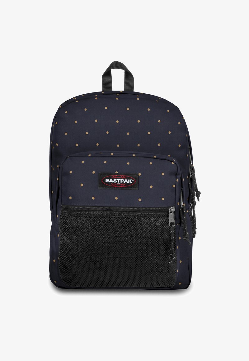 Merensininen reppu kultaisilla pilkuilla, etumaisessa verkkotaskussa, kaksilla vetoketjullisilla osastoilla ja tukevalla yläkahvalla. Eastpak-logo edessä.