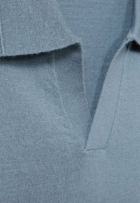 Reiss Bluză polo - airforce blue