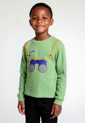 Green long-sleeve shirt featuring a graphic of binoculars on the front, completed with orange and blue details. Textured cotton fabric.