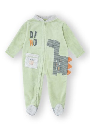Pijama de una pieza verde y suave con diseño de dinosaurio, detalles en gris, un bolsillo delantero y picos naranjas en la espalda. Cierre de cremallera.