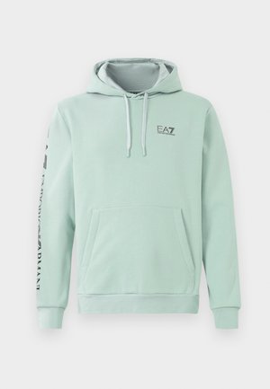 Felpa verde menta in tessuto misto cotone, dotata di tasca a marsupio davanti, cappuccio con coulisse e testo del logo nero lungo la manica.