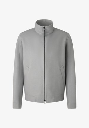 Grijze fleecejas met een hoge kraag, voorrits en zijzakken. Eenvoudig ontwerp met een gladde textuur en een getailleerde pasvorm.