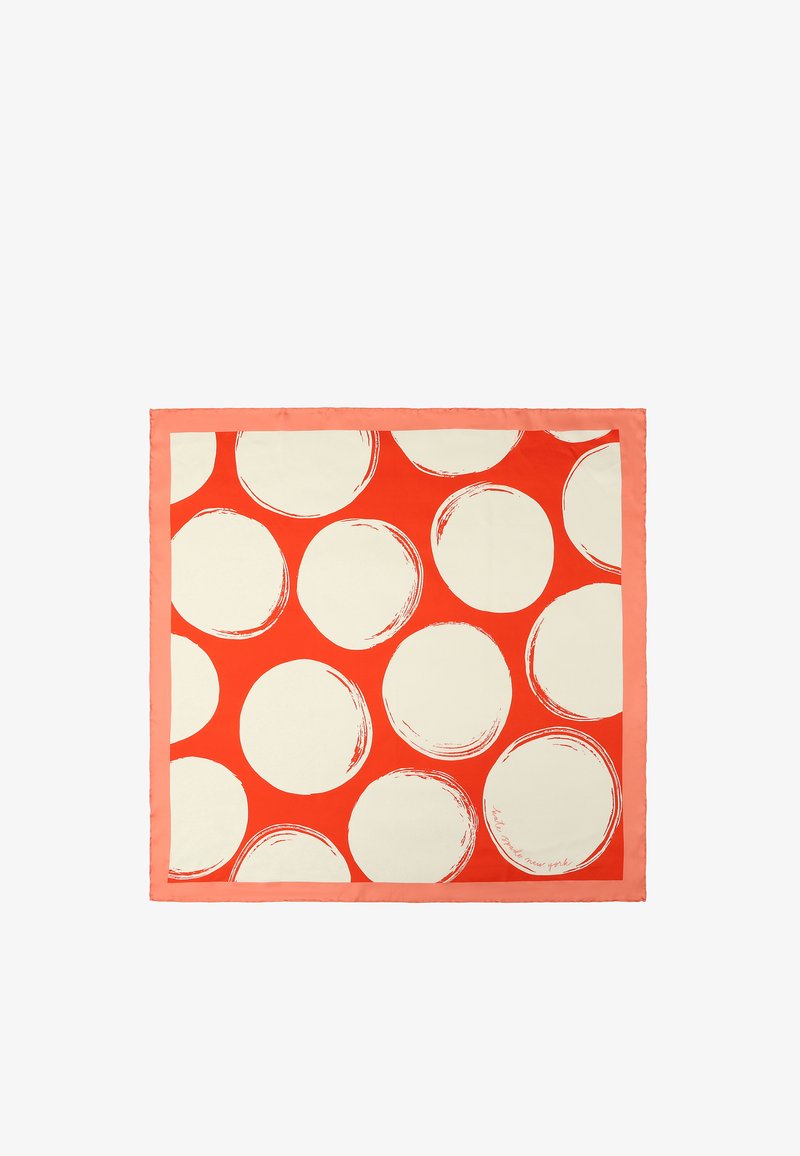 Écharpe en soie présentant un fond rouge vif avec de grands cercles blancs bordés de marron. Finition avec une bordure pêche.
