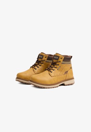 INSIDE Botines con cordones - amarillo