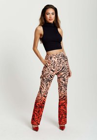 Liquorish WITH SLIT DETAIL - Trousers - red