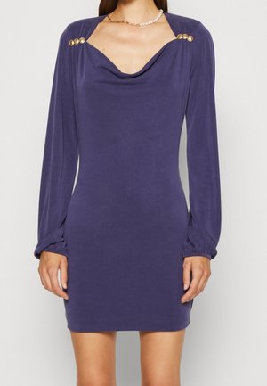 Purple long-sleeve dress with cowl neckline, gold accent buttons at shoulders, and fitted silhouette. Soft fabric with slight sheen.