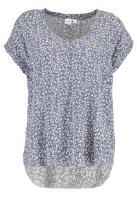 Blouse à manches courtes avec motif floral bleu, décolleté en V et un ourlet arrière légèrement plus long. Tissu léger avec une texture douce.