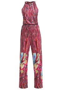 Mouwloze rode jumpsuit met draaiende patronen en grote multicolor bloemenprints nabij de wijde broekspijpen.