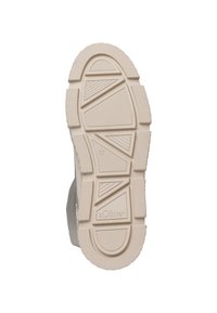 Semelle extérieure de sneaker blanche en caoutchouc, mettant en avant des motifs de texture et de marquage, avec une indication de taille bien visible de 37.