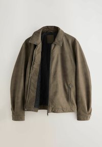 Olive green jacket made of smooth, matte fabric with a structured collar, side zip pocket, and a quilted black lining.
