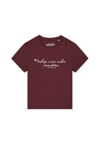 Bordeauxrot Baumwoll-T-Shirt mit rundem Ausschnitt. Mit weißem Text, der "Früher war mehr Lametta" sagt. Weiches Material, kurze Ärmel und normale Passform.