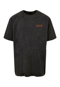 Sort bomulds T-shirt med rund hals, korte ærmer og kontrasterende brun tekst, der står "migonales" på den øverste venstre bryst.