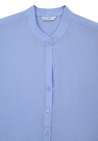 Light blue button-up shirt in textured fabric. Features a mandarin collar and six buttons down the front. Tag shows "CALLIOPE" and size S.