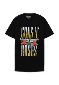 T-shirt in cotone nero con la scritta "GUNS N' ROSES" in giallo e bianco usurato, accompagnata da grafica di rose rosse e un'arma. Collo giro, maniche corte.