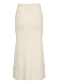 Falda midi de color crema, de punto, con un acabado suave y texturizado y una cintura ajustada, que se ensancha suavemente hacia el dobladillo para una Silueta suave.