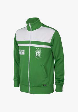 Groen-witte sportjas met ritssluiting, hoge kraag, teamwapen, sponsorlogo, zijzakken en geribde boorden en zoom.