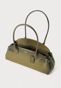 Olive green leather handbag with dual handles, top zip closure, and gold-tone accents. Features a smooth finish and logo detail.