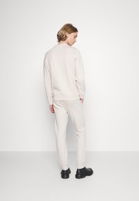 Pier One Calças de fato de treino - tan