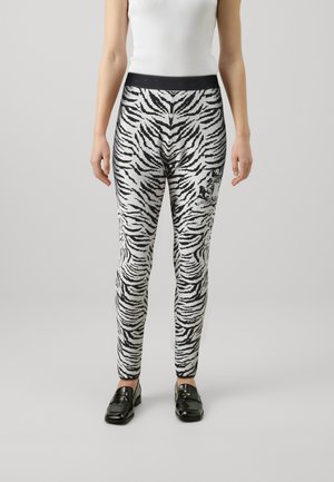 TROUSERS - Leggingsit - black