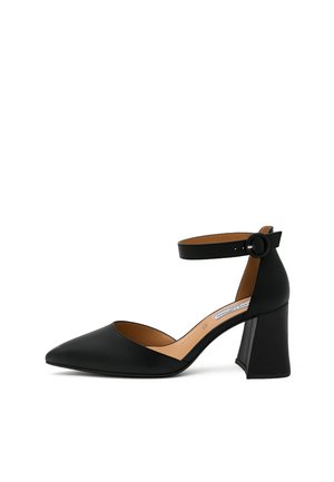 Décolleté nero a punta con cinturino alla caviglia, realizzato in pelle liscia, con tacco chunky e un delicato accento di colore beige all'interno.